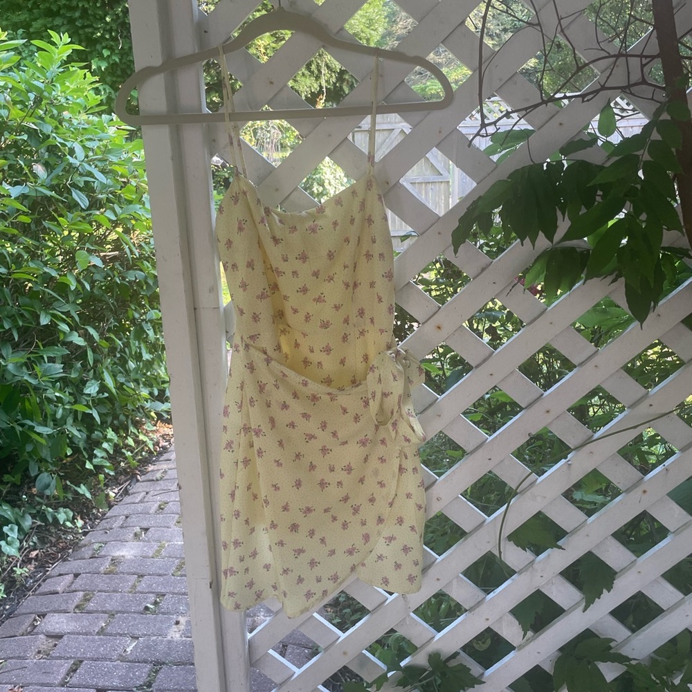 Princess Polly light yellow wrap dress size 2